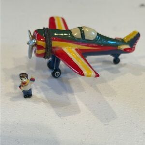 Stunt flyer airplane with little guy trinket box
